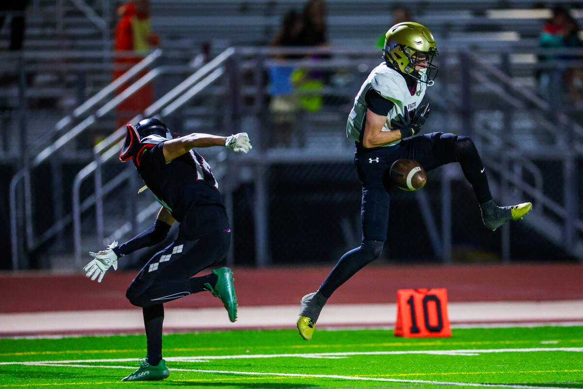 Faith Lutheran wide receiver Jaden Mason (5) misses the ball during a class 5A Southern Region ...