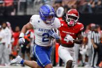 Air Force Falcons running back Owen Allen (2) runs for a touchdown as UNLV defensive back Andre ...