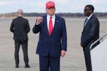 President Donald Trump gestures as he arrives on Air Force One, Thursday, Oct. 30, 2025, at Joi ...
