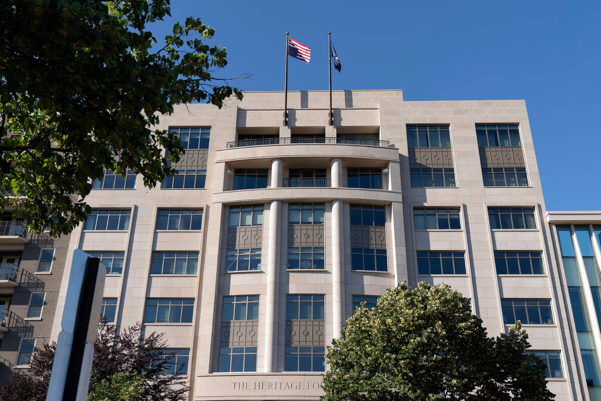FILE -An American flag is seen upside down at the conservative Heritage Foundation in Washingto ...