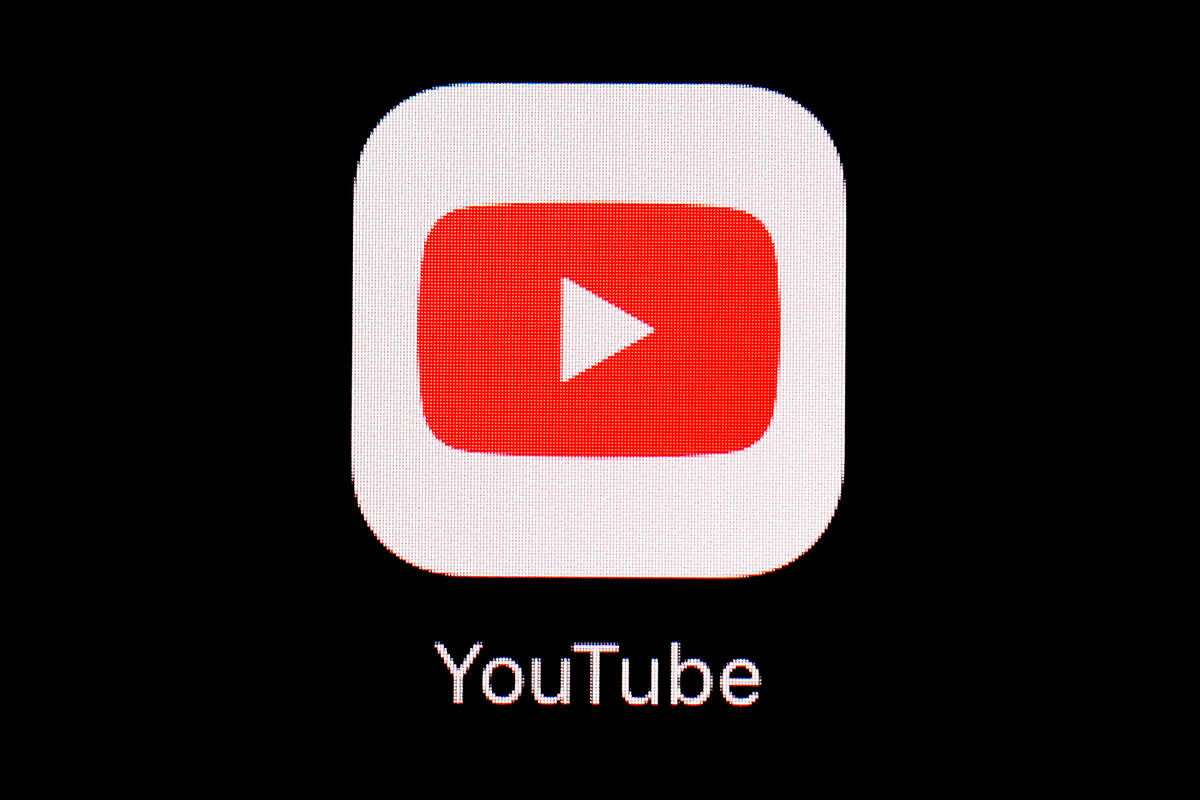 FILE - The YouTube app is displayed on an iPad in Baltimore on March 20, 2018. (AP Photo/Patric ...