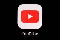 FILE - The YouTube app is displayed on an iPad in Baltimore on March 20, 2018. (AP Photo/Patric ...