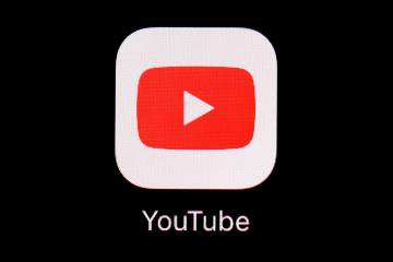 FILE - The YouTube app is displayed on an iPad in Baltimore on March 20, 2018. (AP Photo/Patric ...