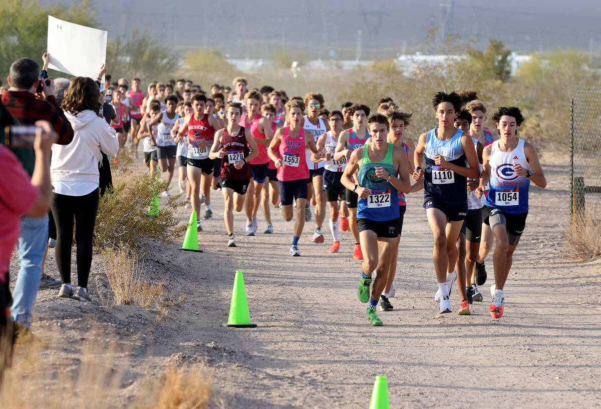 Runners make their way around the course during the Nevada Interscholastic Activities Associati ...