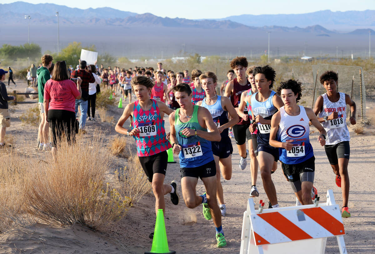 Runners make their way around the course during the Nevada Interscholastic Activities Associati ...
