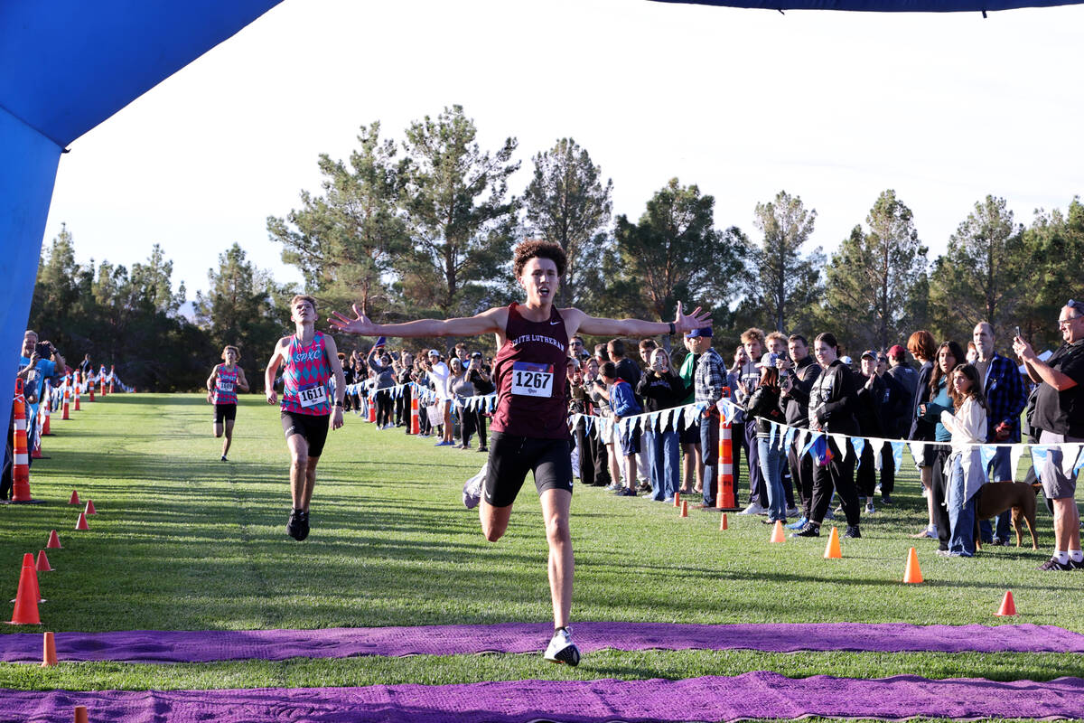 Faith Lutheran’s Brady Anderson (1267) runs ahead of Sky Pointe’s Carter Prater (1611) and ...