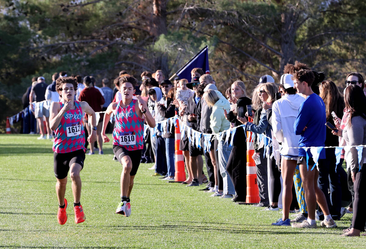 Sky Pointe’s Shane Ramirez (1612) and Ryan Petty race to the finish during the Nevada Intersc ...