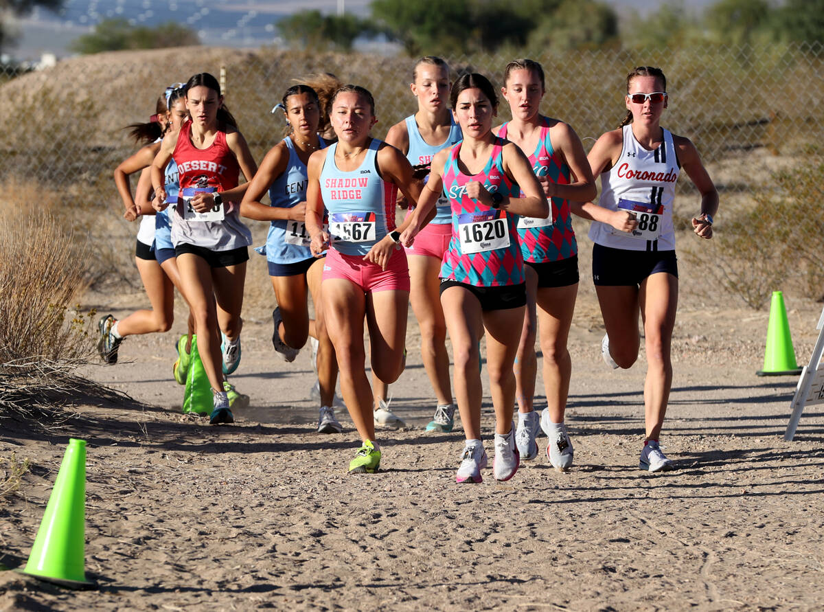 Runners make their way around the course during the Nevada Interscholastic Activities Associati ...