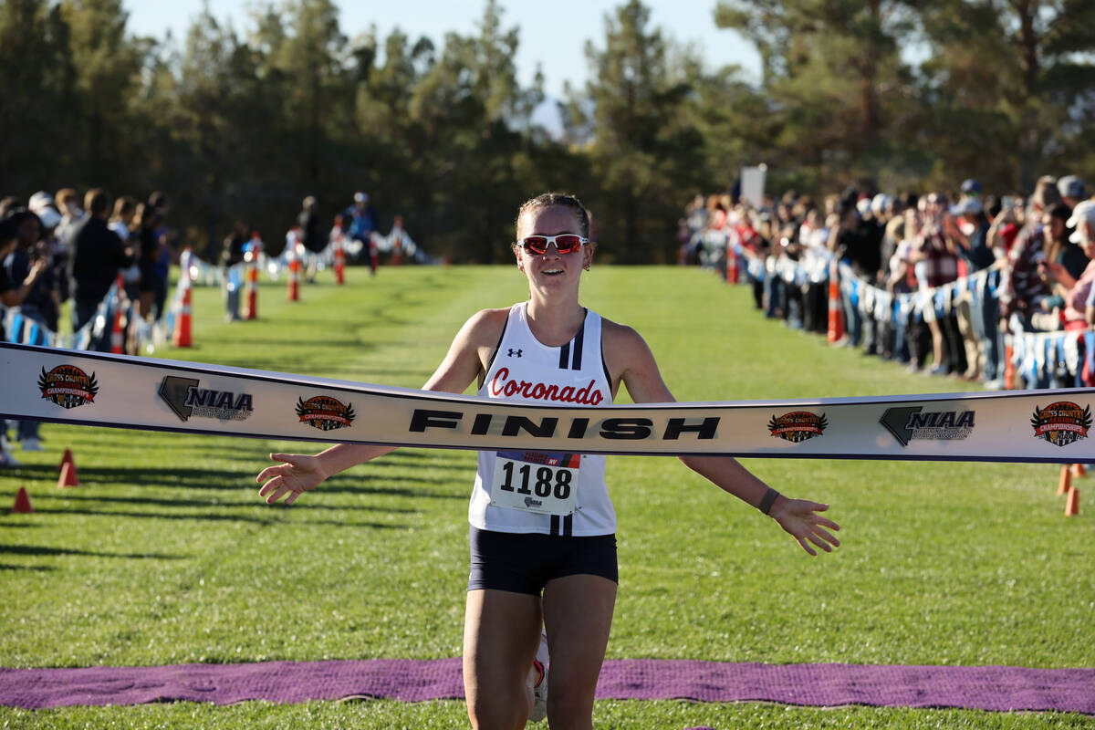Coronado’s Brooke-Lynne Miller (1188) crosses the finish line to win the Nevada Intersch ...