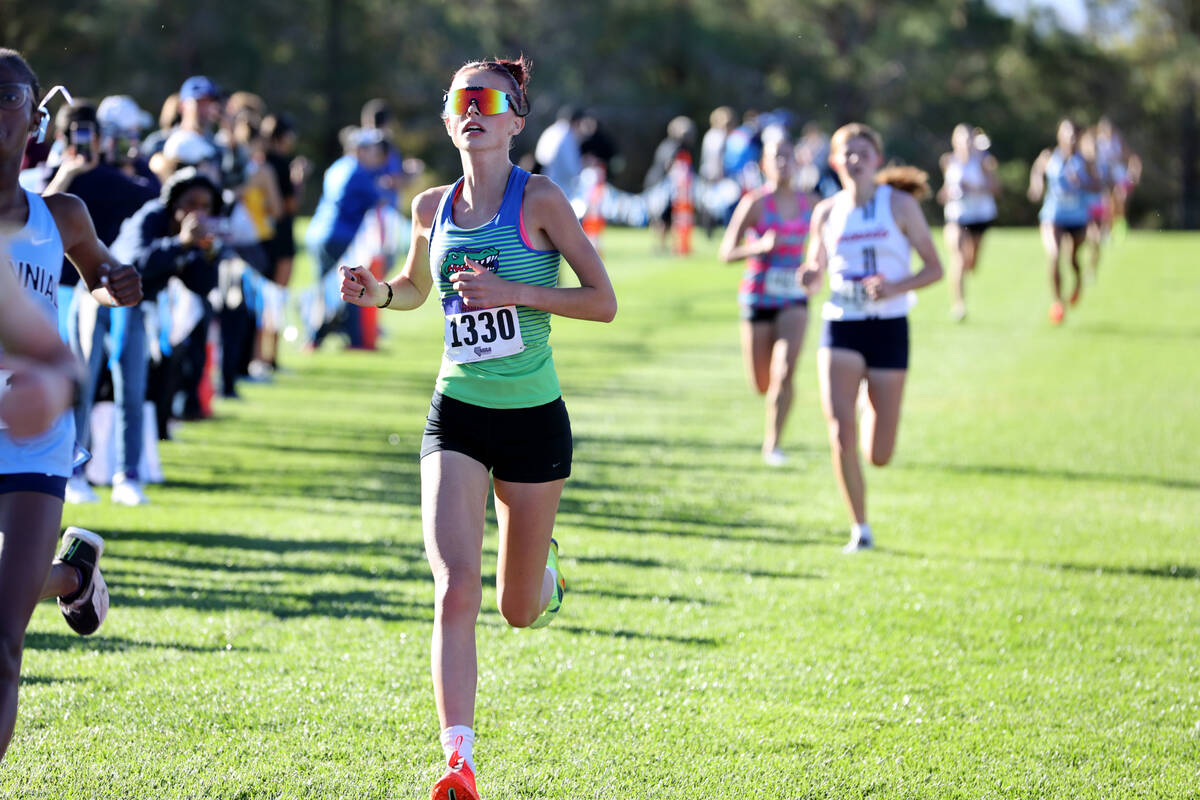 Green Valley’s MaryJane Gutierrez-Hess (1330) races to the finish during the Nevada Inte ...