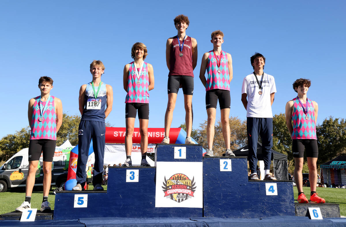 The top seven finishers pose during the Nevada Interscholastic Activities Association Class 5A ...