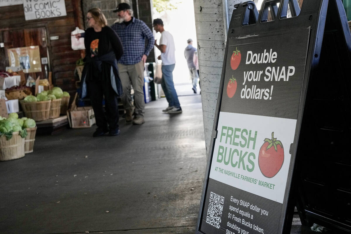 A sign about USDA Supplemental Nutrition Assistance Program (SNAP), benefits is displayed at a ...