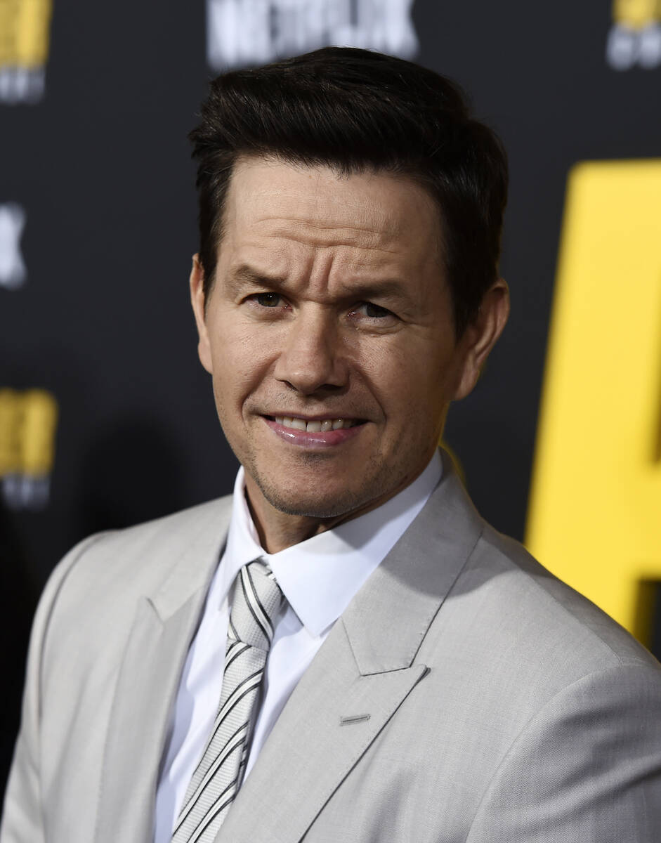 Mark Wahlberg, star of the Netflix film "Spenser Confidential," poses at the premiere ...