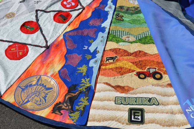 Above, a tree skirt for “Silver Belle” with sections representing each Nevada county. (Chri ...