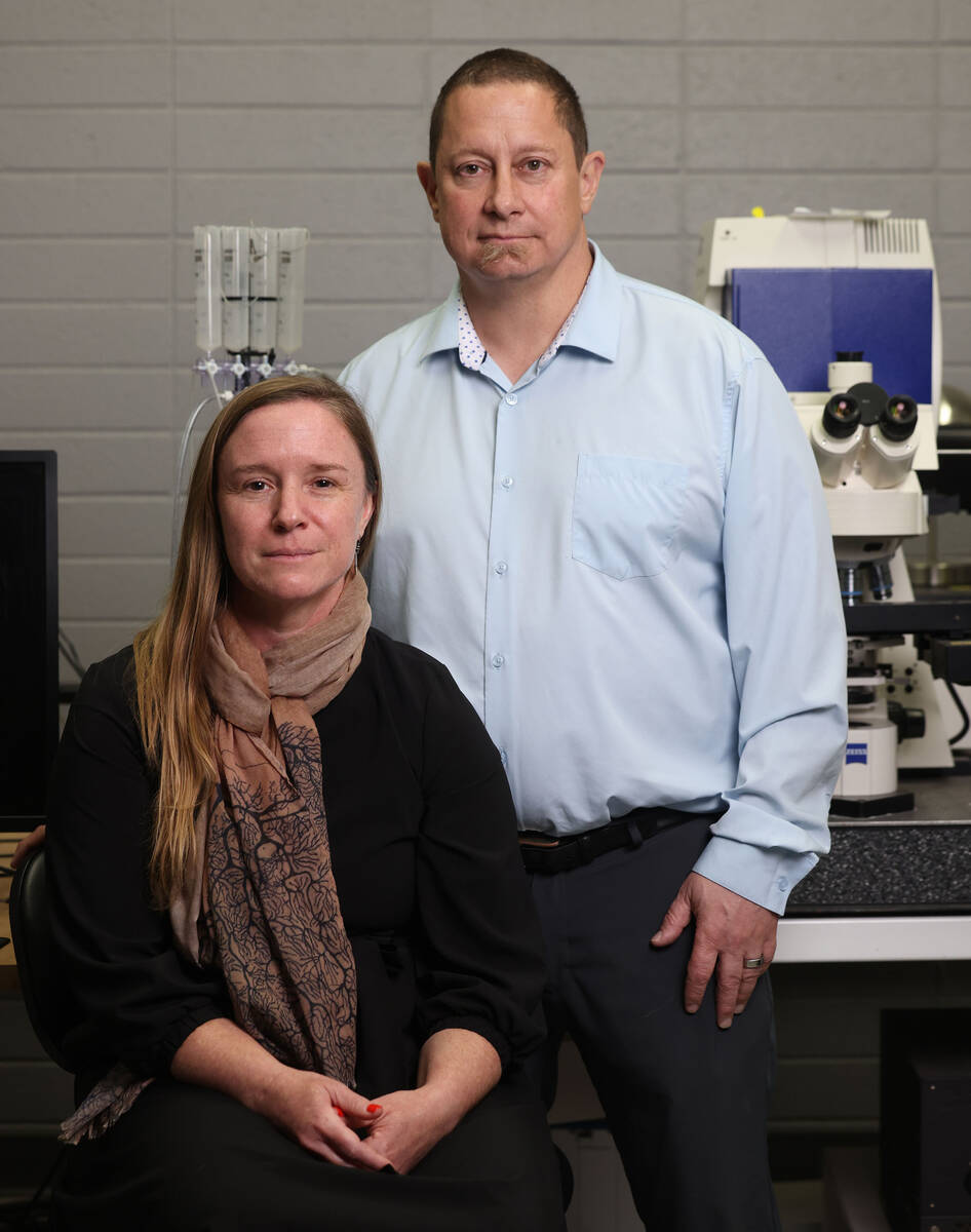UNLV associate professors of neuroscience Rochelle and Dustin Hines are photographed in their l ...