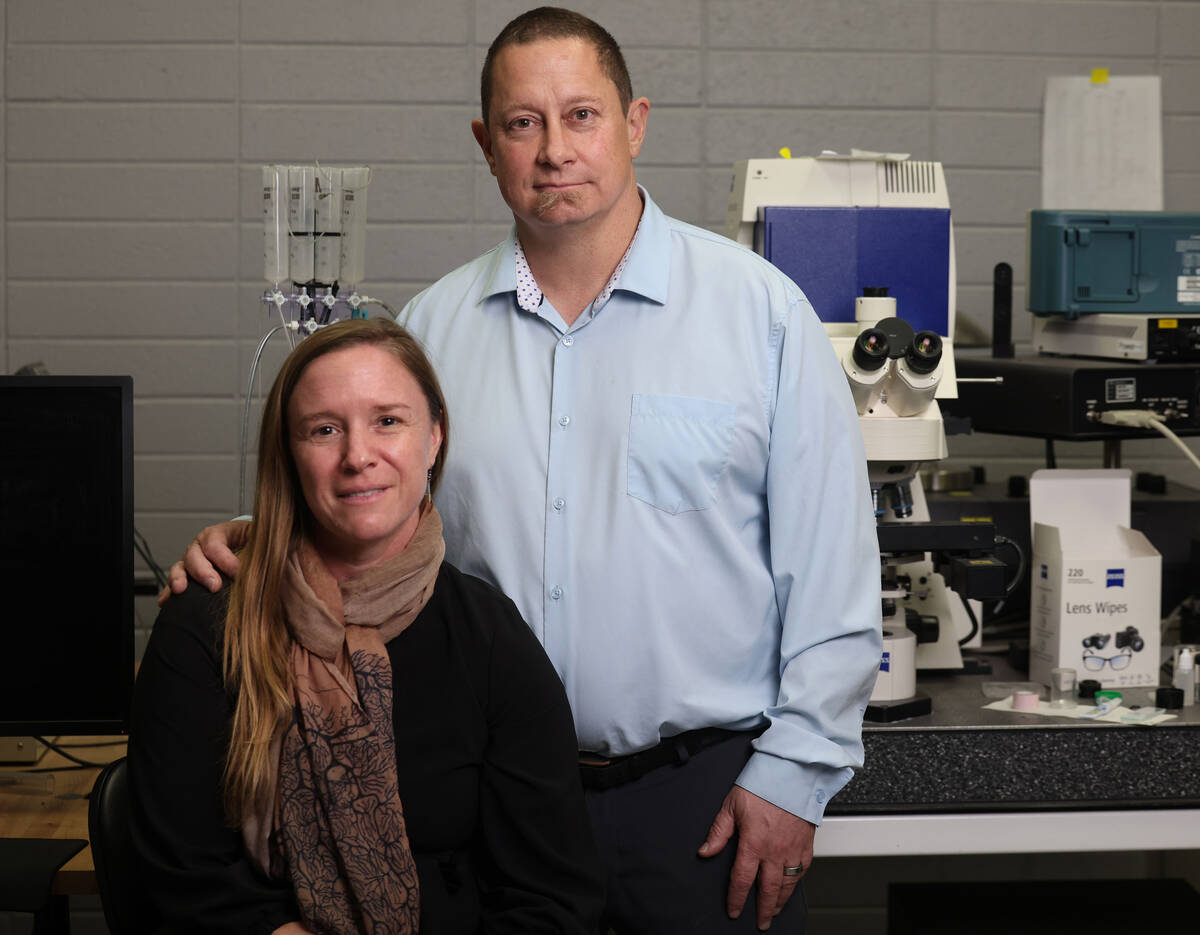 UNLV associate professors of neuroscience Rochelle and Dustin Hines are photographed in their l ...