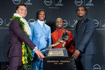 Heisman Trophy finalists, from left, Oregon's Dillon Gabriel, Colorado's Travis Hunte ...