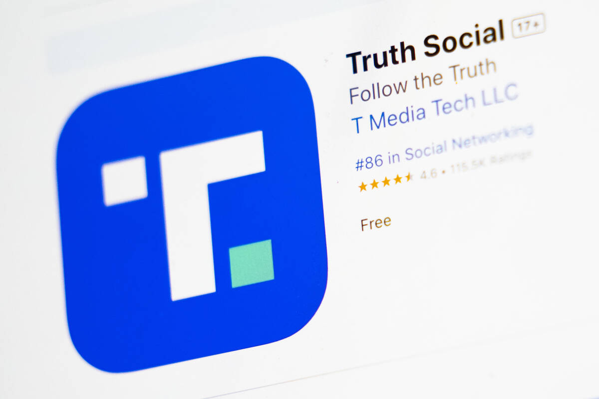 The download screen for Truth Social app is seen on a laptop computer, March 20, 2024, in New Y ...