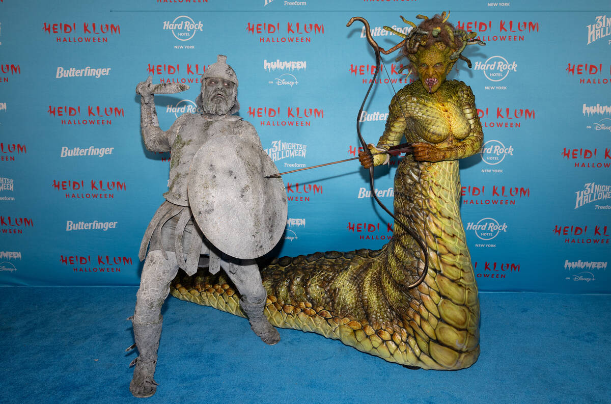 Tom Kaulitz, left, and Heidi Klum attend Heidi Klum's 24th annual Halloween party at Hard ...