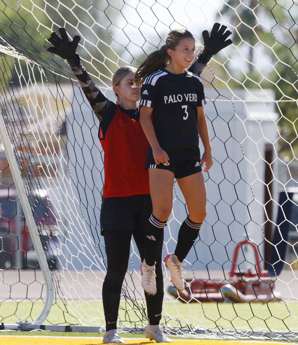 Palo Verde forward Olivia Gastwirth (3) tries to block Doral Academy goalkeeper Kenadie Mashore ...
