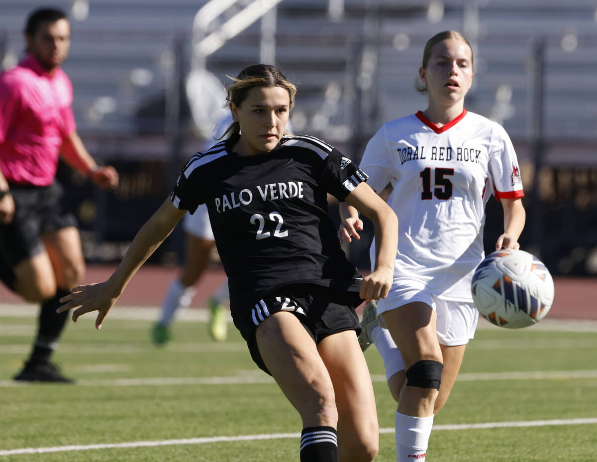 Palo Verde midfielder Caitlynn Nick (22) kicks the ball ahead of Doral academy midfielder Taylo ...