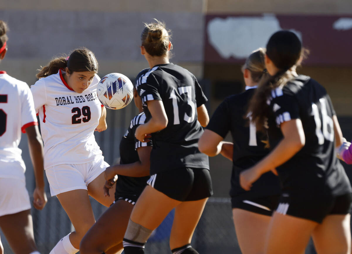 Doral Academy forward Sienna Turco (29) goes for a header against Palo Vede during a Class 4A S ...
