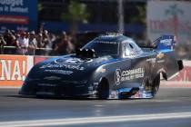 In this photo provided by the NHRA, reigning Funny Car world champion Austin Prock takes the pr ...