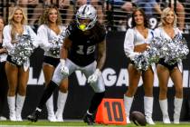 Raiders wide receiver Jakobi Meyers (16) flexes after making a catch during the second half of ...