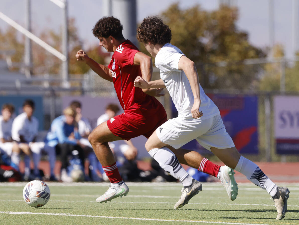 Palo Verde midfielder Trusten Parker, right, chases Coronado striker Dylan Flores (9) during a ...