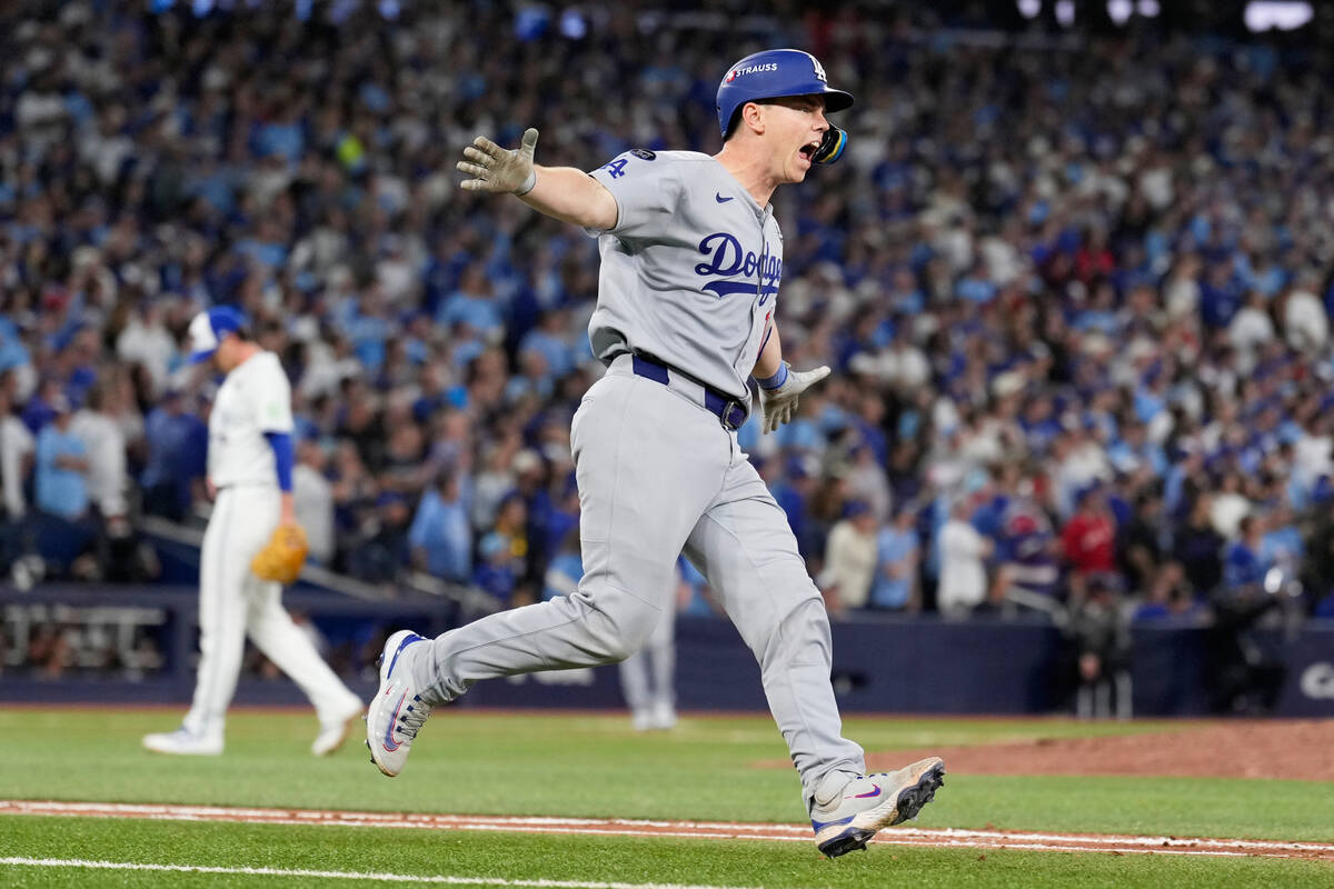 Los Angeles Dodgers' Will Smith celebrates a home run against the Toronto Blue Jays during ...
