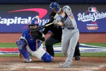 Los Angeles Dodgers' Will Smith connects for a home run against the Toronto Blue Jays duri ...