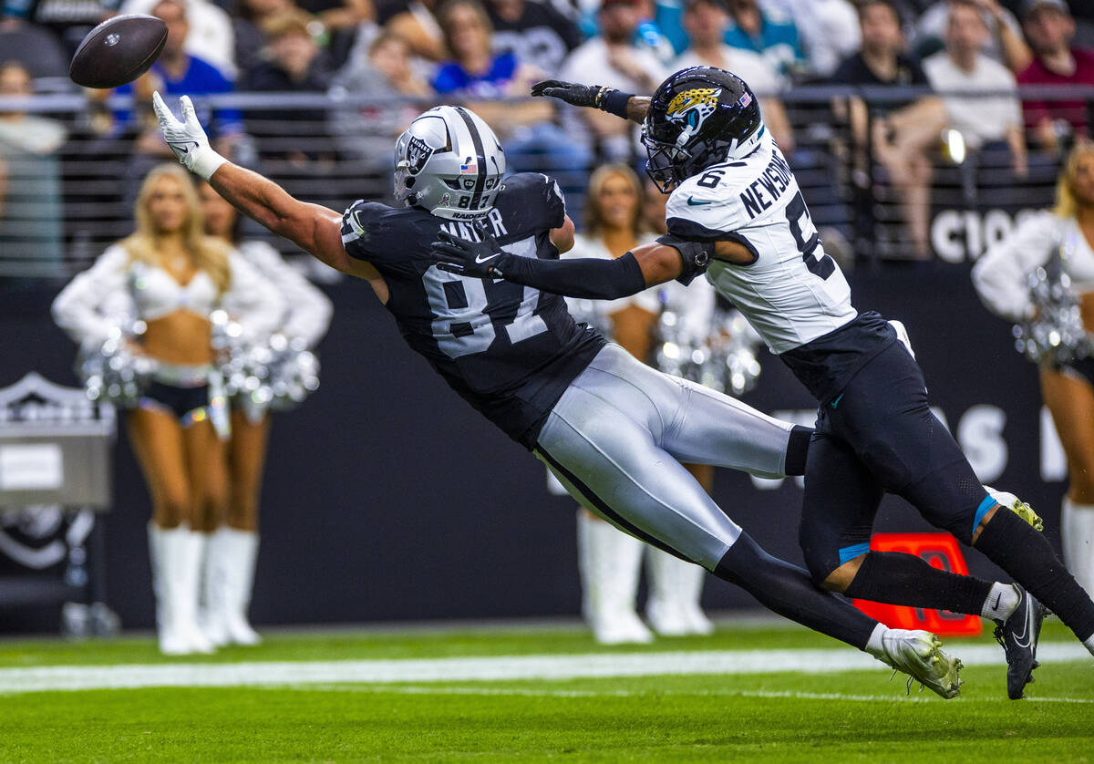 Raiders tight end Michael Mayer (87) just misses a long pass against Jacksonville Jaguars corne ...
