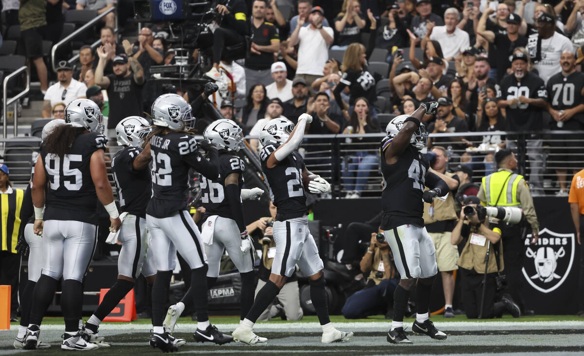 Raiders safety Isaiah Pola-Mao (20) celebrates after an interception against the Jacksonville J ...