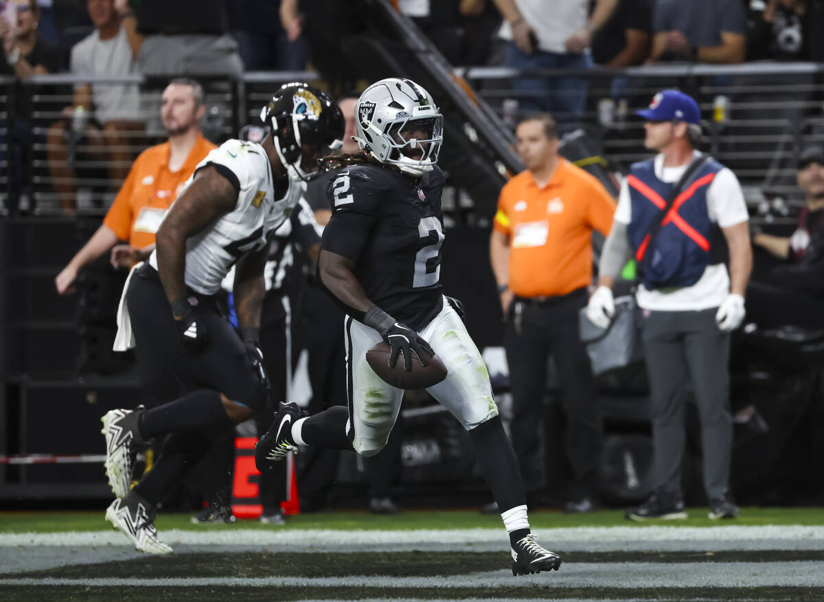 Raiders running back Ashton Jeanty (2) scores a touchdown against the Jacksonville Jaguars duri ...