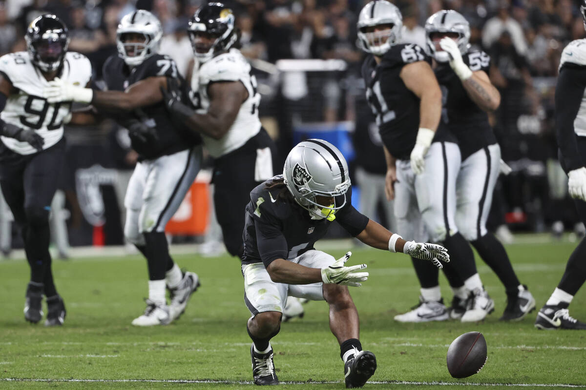 Raiders wide receiver Tre Tucker (1) misses the pass during overtime in an NFL game against the ...