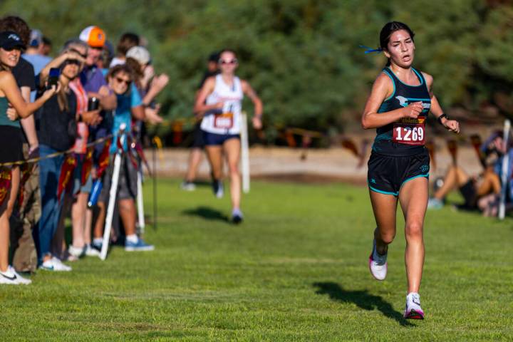 Somerset Academy Sky Pointe High School runner Aislin McMahon (1269) nears the finish line ...