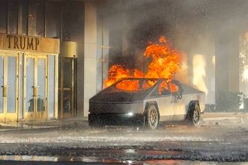 In a screen grab, a fully engulfed Tesla Cybertruck is seen in the valet area outside Trump Int ...