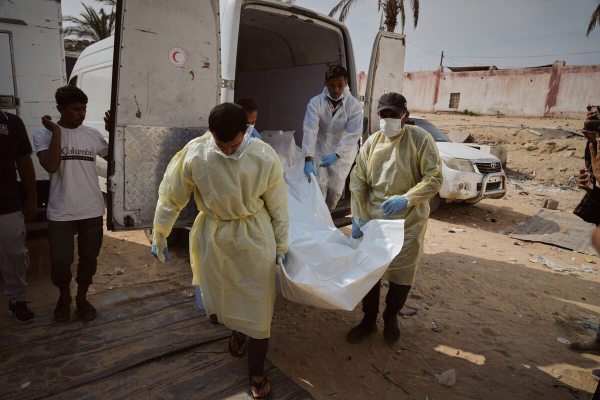 Bodies of unidentified Palestinians returned from Israel as part of the ceasefire deal are brou ...