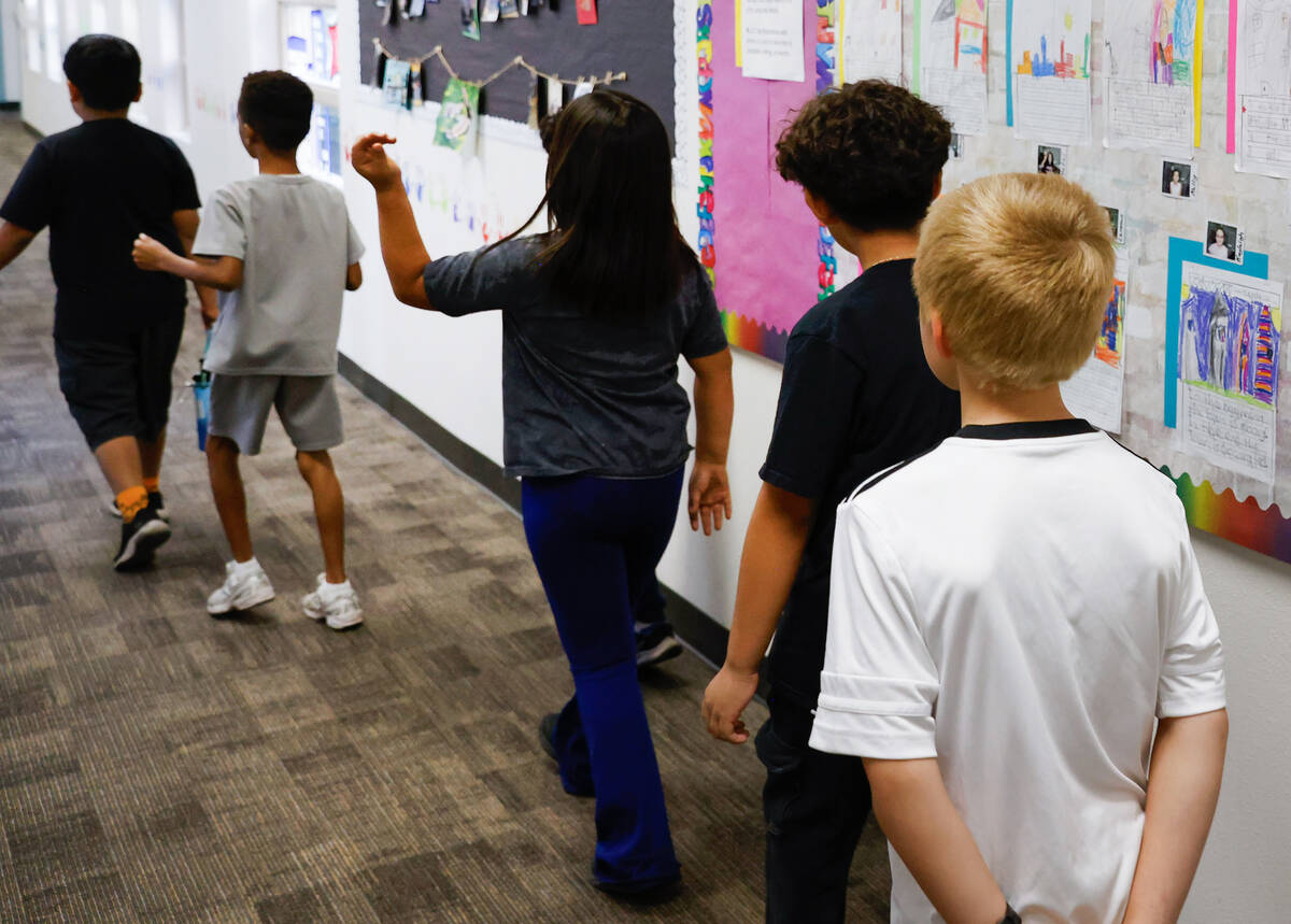 Students head to their classroom at Richard Bryan Elementary School on Tuesday, Nov. 4, 2025, i ...