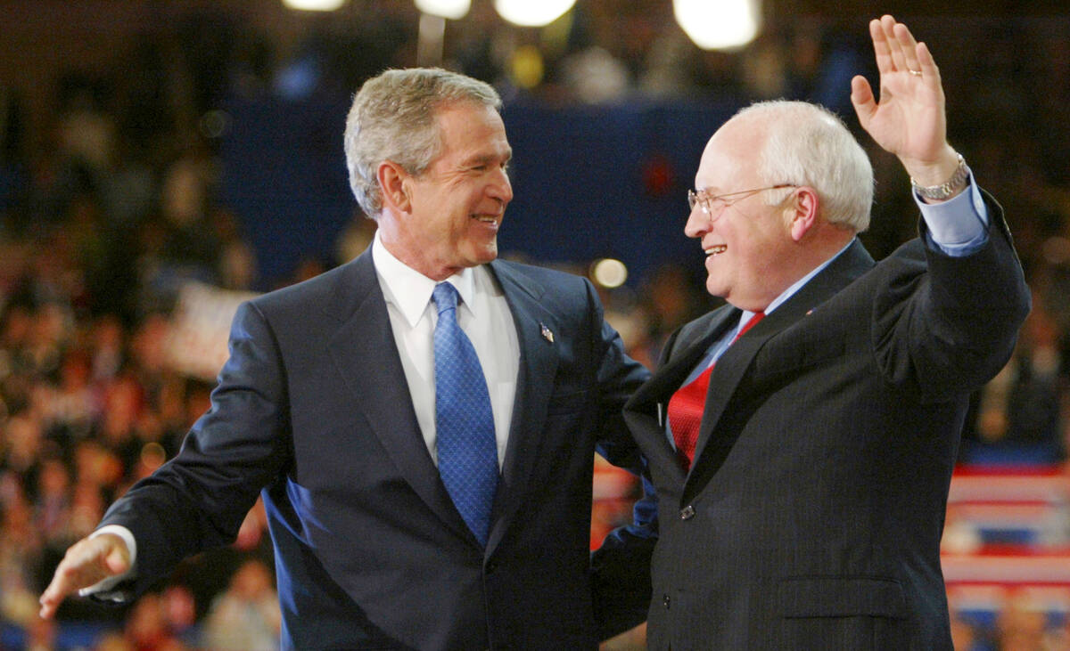 President Bush and Vice President Dick Cheney embrace following President Bush's acceptance spe ...