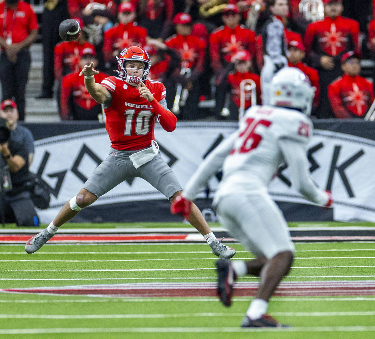 UNLV quarterback Anthony Colandrea (10) elevates as he gets off a late pass with New Mexico Lob ...