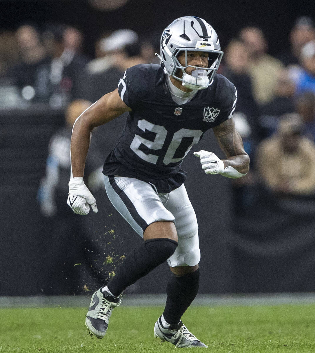 Raiders safety Isaiah Pola-Mao (20) defends during the first half of an NFL game against the Lo ...