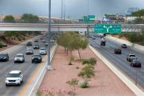 Motorists navigate on Airport Connector Interchange near Sunset Road off-ramp on Thursday, Aug ...