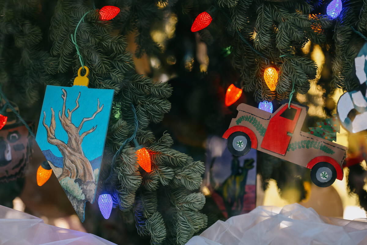 Ornaments adorn the U.S. Capitol Christmas tree, nicknamed “Silver Belle,” as it passes thr ...