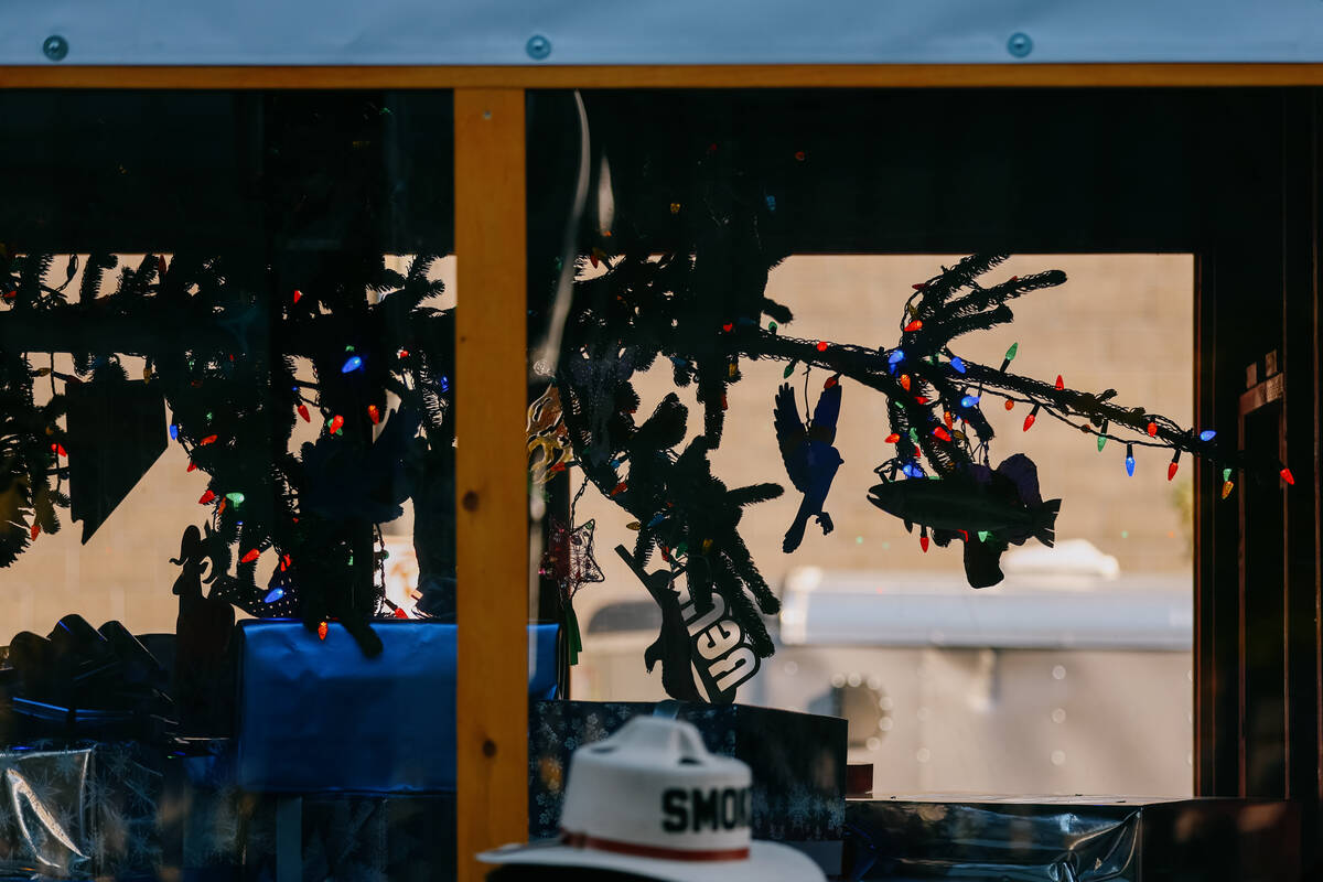Ornaments adorn the U.S. Capitol Christmas tree, nicknamed “Silver Belle,” as it passes thr ...