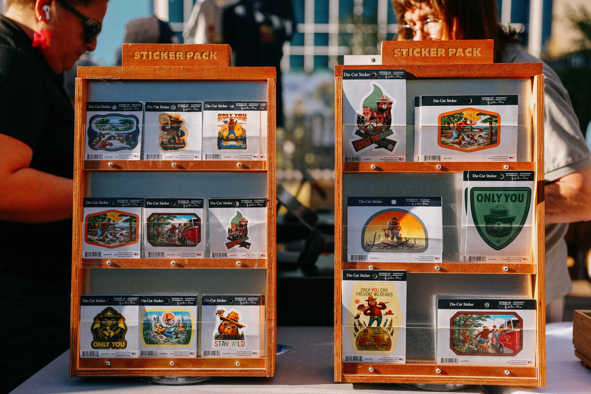 A booth sells Smoky Bear stickers during the celebration for the U.S. Capitol Christmas tree, n ...