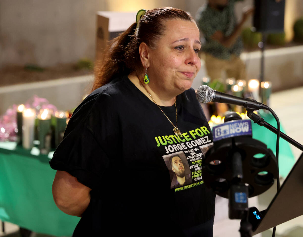 Jeanne Llera, mother of Jorge Gomez, speaks during a vigil for her son outside the Lloyd George ...