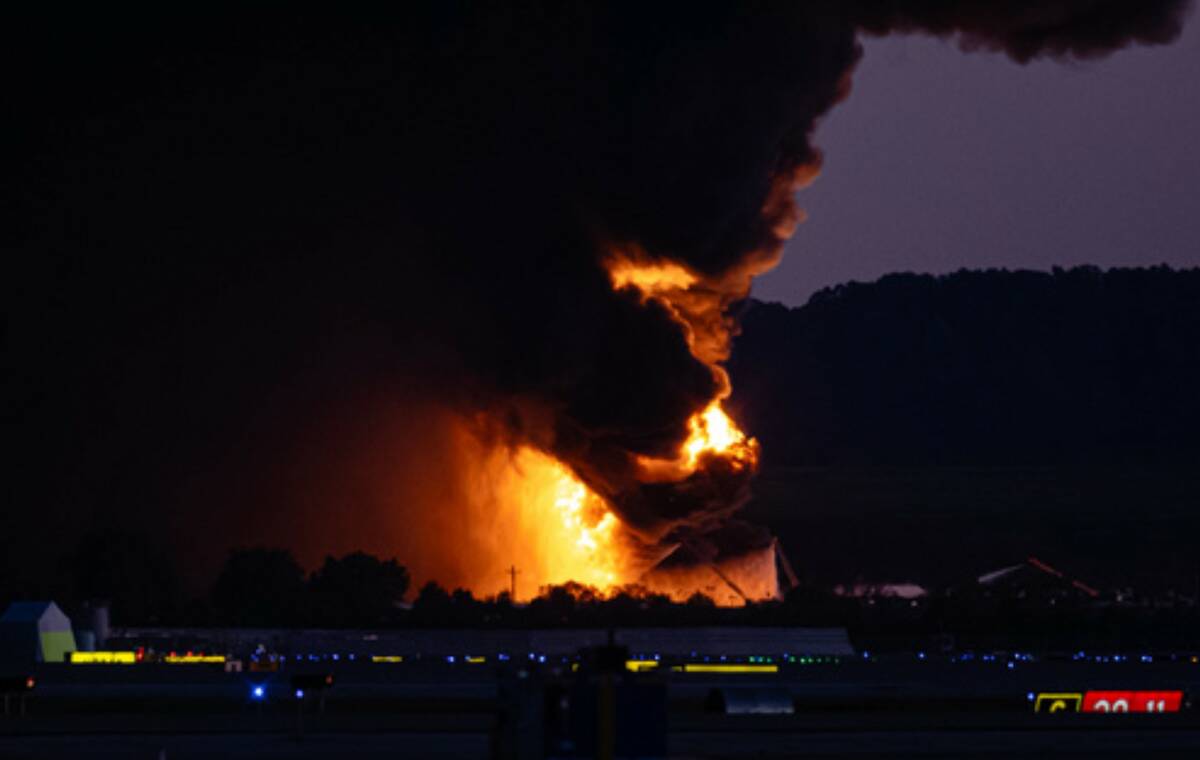 A fireball erupts near airport property after reports of a plane crash at Louisville Internatio ...