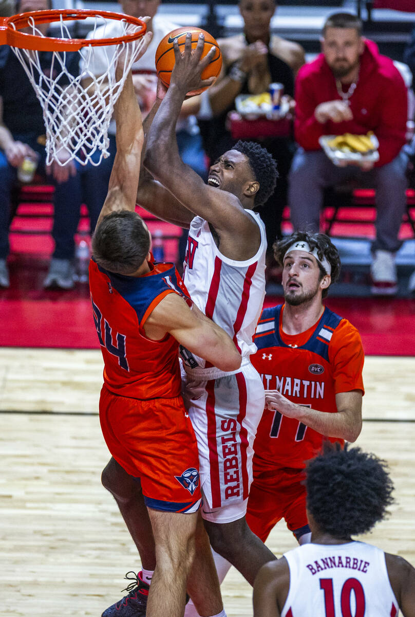 UNLV forward Kimani Hamilton (2) powers up inside against UT Martin Skyhawks forward Vladimir K ...