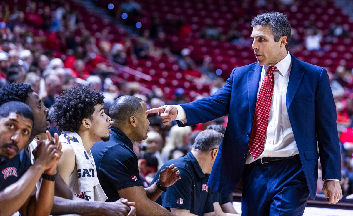 UNLV head coach Josh Pastner points to UNLV guard Al Green (7) on the bench against the UT Mart ...